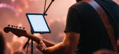musician playing using tablet